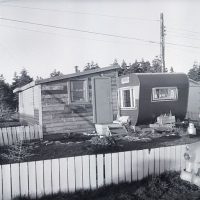 black and white photo of a trailer park