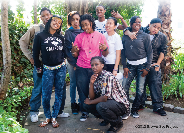group of nine Black and Brown teens smiling