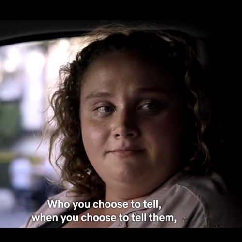 image of young woman listening to a second speaker saying "who you choose to tell, when you choose to tell them"