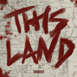 "this land" is written in blood over an old map of the united states